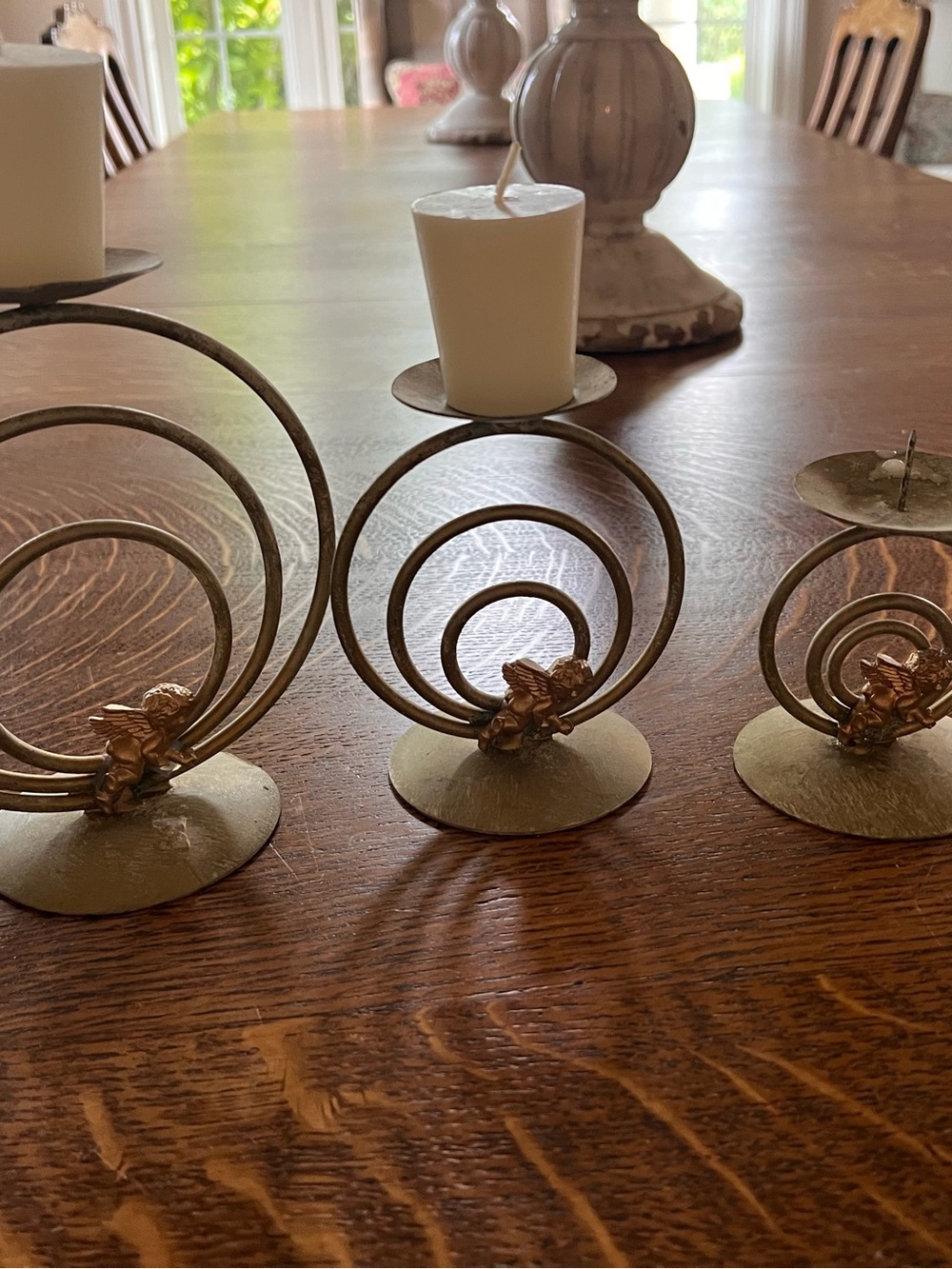 Gold Spiral Candle Holders with Cream Candles